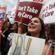 People cheer in front of the U.S. Supreme Court after ruling was announced on the Affordable Care Act June 25, 2015, in Washington, D.C. The court ruled that the Affordable Care Act may provide nationwide tax subsidies to help poor and middle-class people buy health insurance.
Mark Wilson/Getty Images